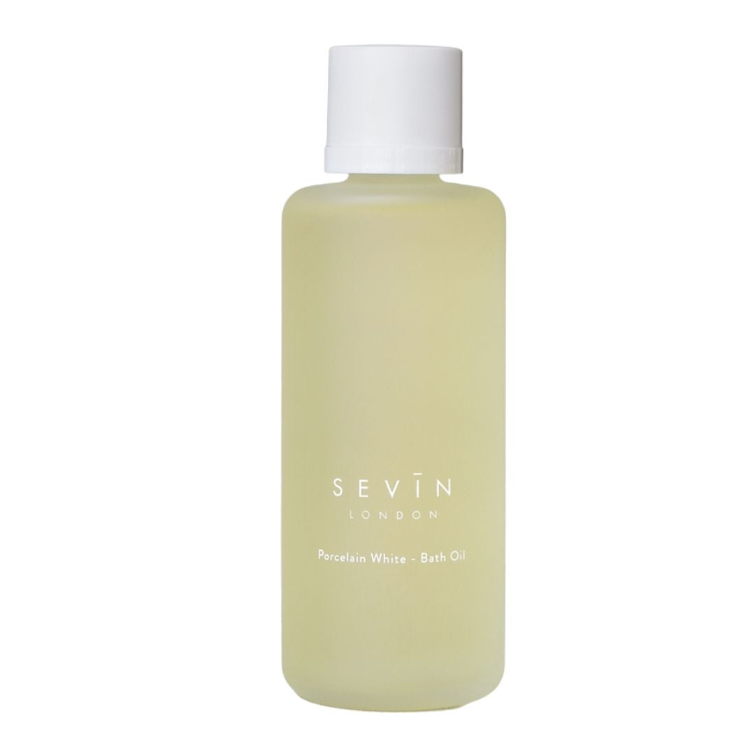 Bottle of Sevin London Porcelain White Bath Oil on a white background