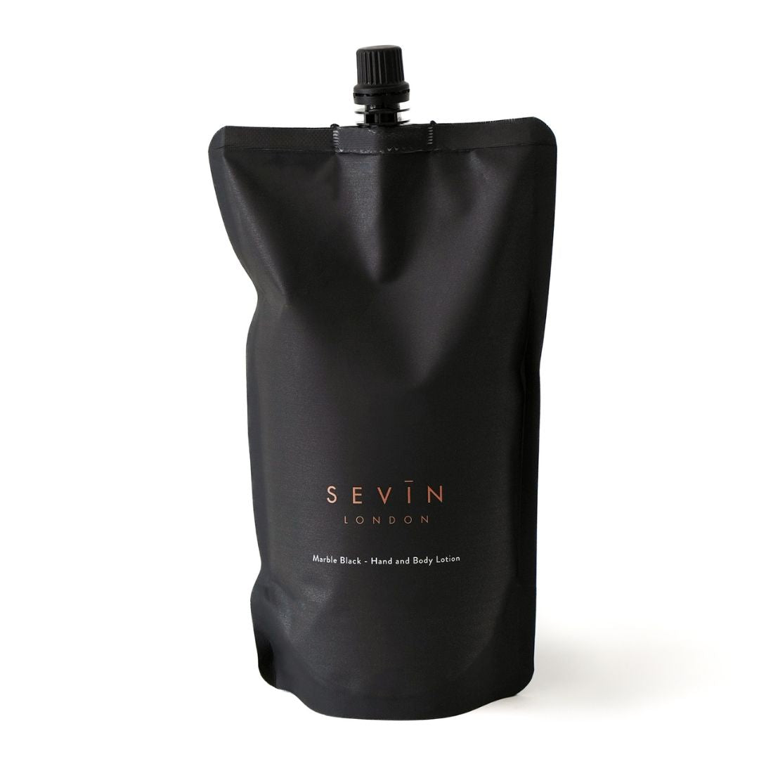 Marble Black Sevin London lotion pouch on a white background