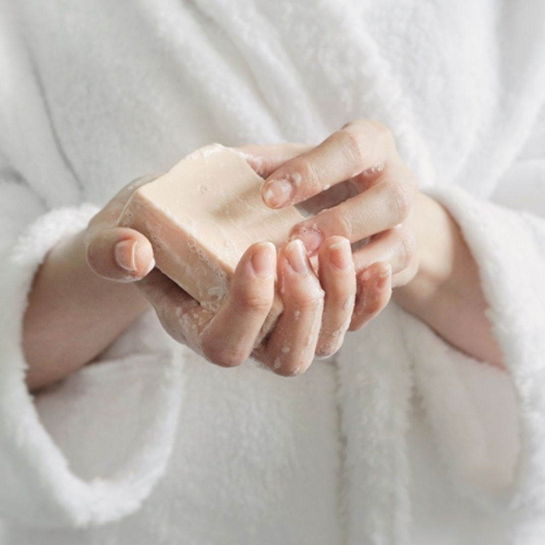 Woman holding SEVIN London Soap