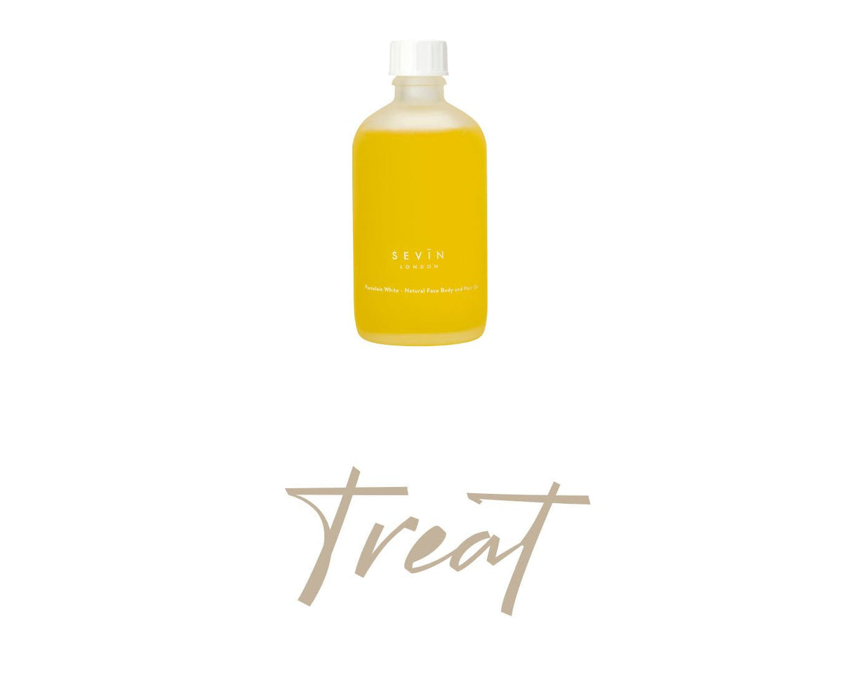 A clear bottle filled with bright yellow liquid, shown against a white background with the word 'treat' in a beige script below it. The bottle label shows the brand 'SEVIN'.