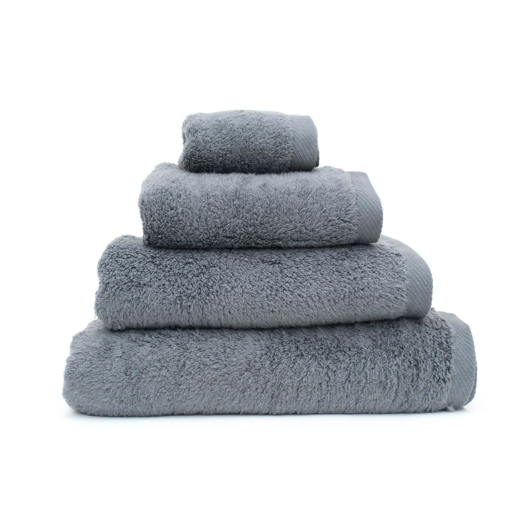Stack of gray towels on a white background