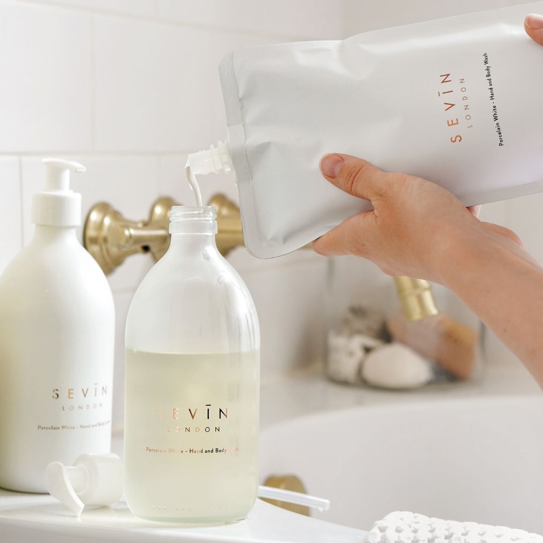 Bath products with 'Sevin London' branding on a bathroom counter.